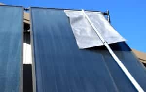 Solar panels being cleared off by a Roof Razor